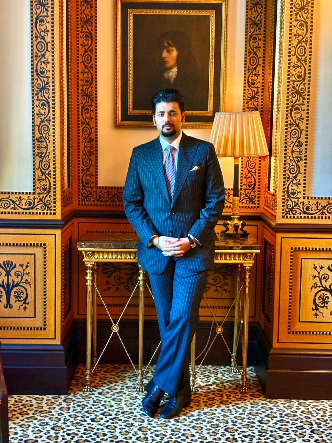 Manvedeep Singh in a grand drawing room